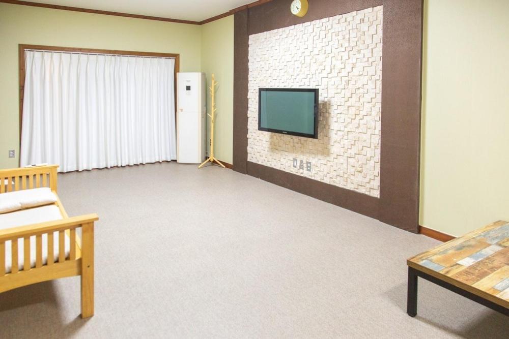 Santa Beach Pension Gangneung Rom bilde